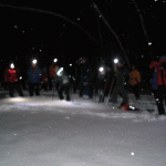 group-gathers-in-field
