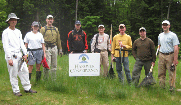 Volunteers from Hypertherm post at Greensboro Ridge workday