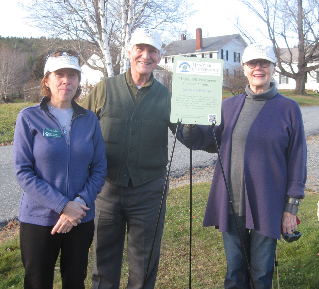 HC President Nancy Collier with Michael and Lili Mayor and the new Mayor-Niles Forest sign.